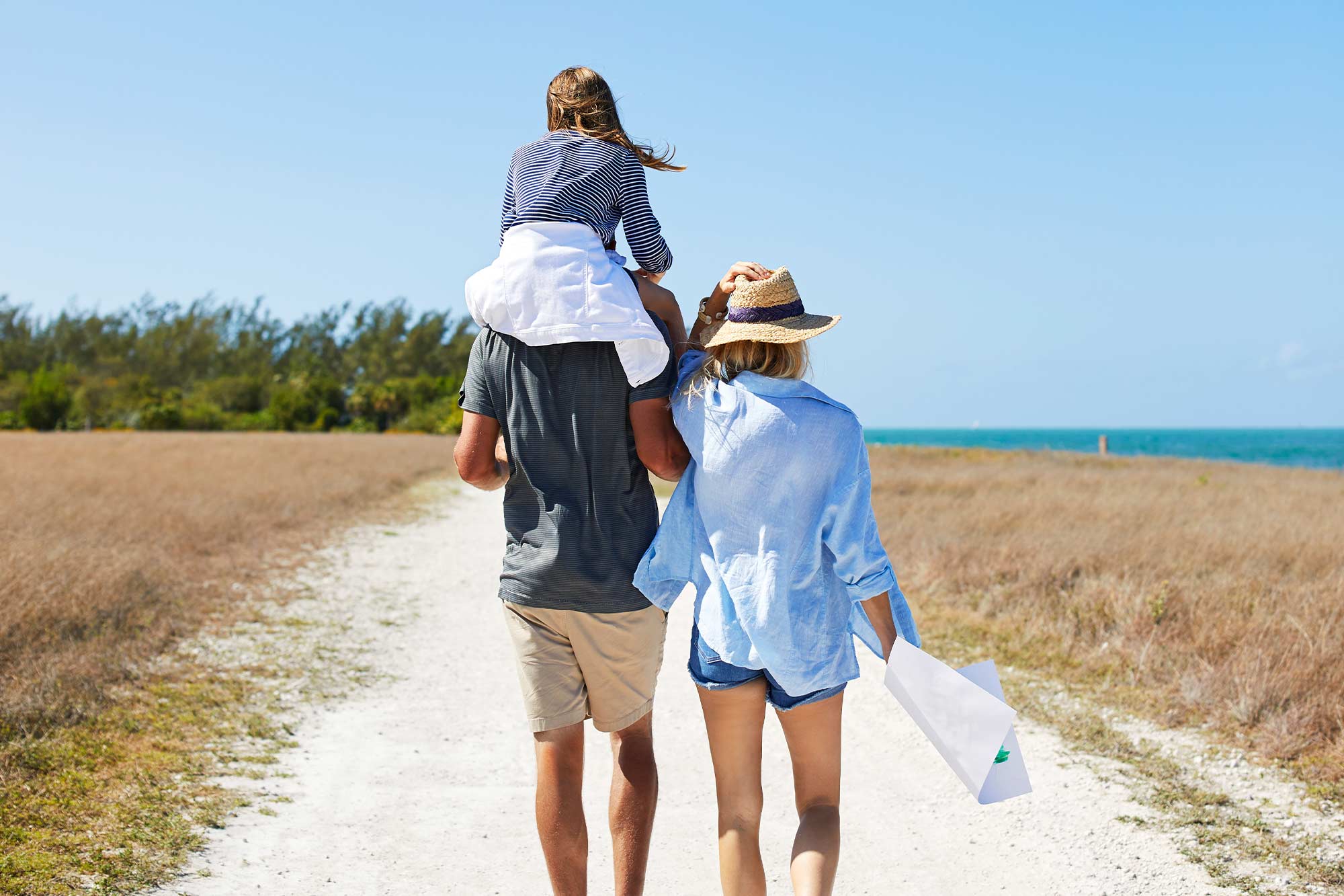 Katie Holtkamp walking with her family